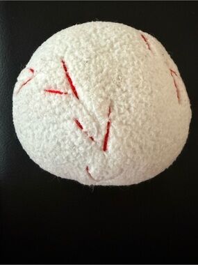 White Textured Plush Ball with Red Stitching